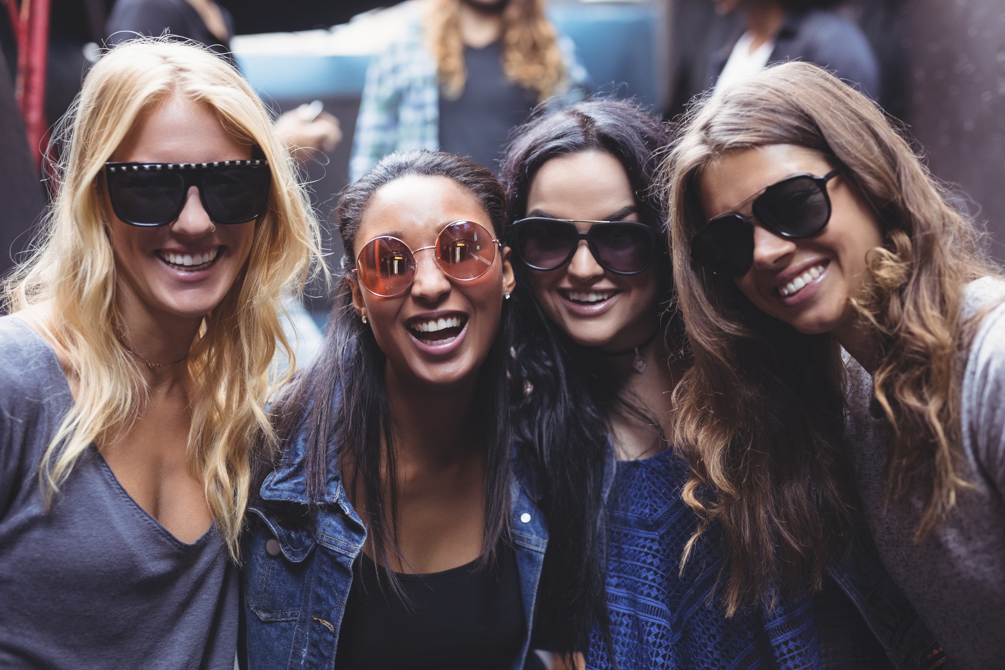 Portrait of female friends wearing sunglasses Portrait of female friends wearing sunglasses